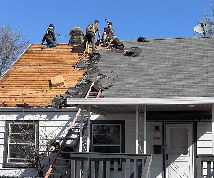 Roofers installing a new roof in West Allis, WI