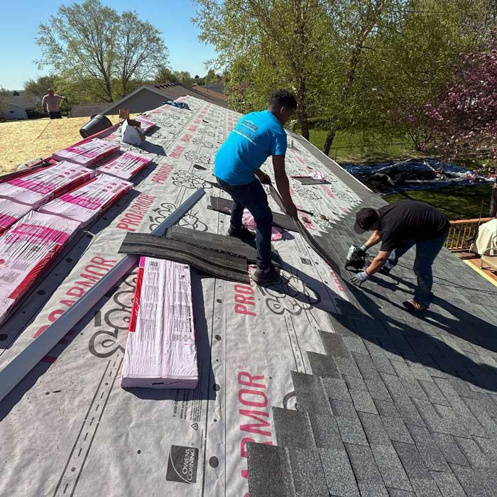 A First Choice Roofing worker working on the new roof installation in Cudahy WI