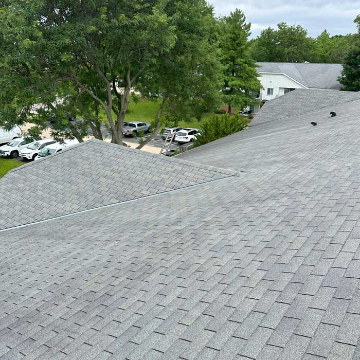 Contractors installing a new roof in West Allis, Wisconsin