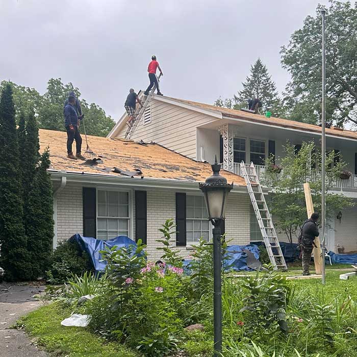 Roof installation team working in Menomonee Falls Wisconsin