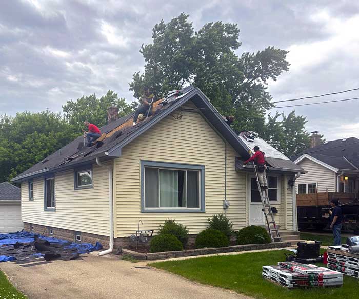 Crew installing a new roof in Sussex WI